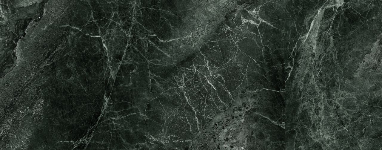 Dark marble texture with white veins.