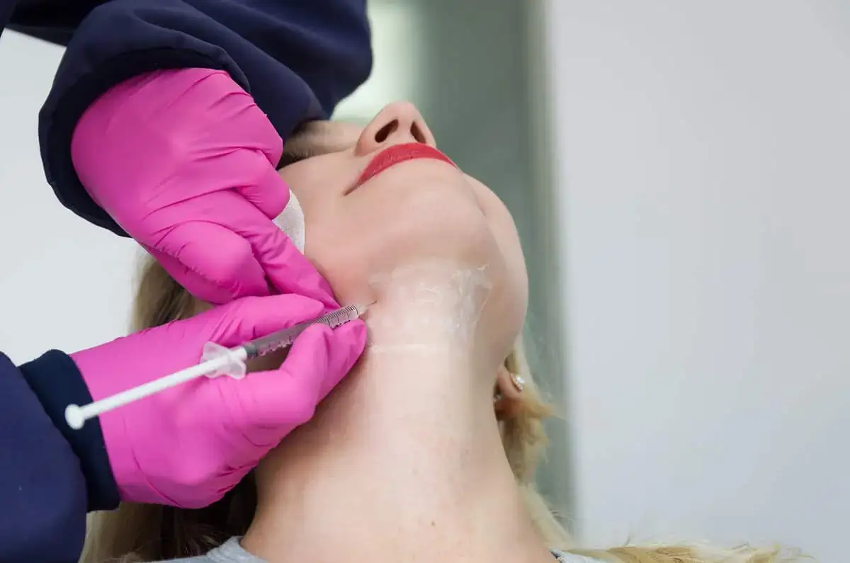 Woman with injection over the neck | Soul And Beauty Med X | Mission Viejo CA