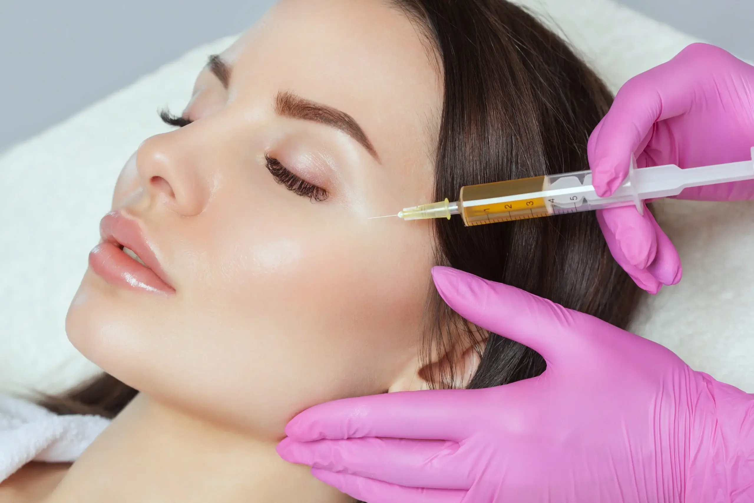 Doctor providing injection over the cheeks for a women | soul and beauty medx. | Mission Viejo, CA
